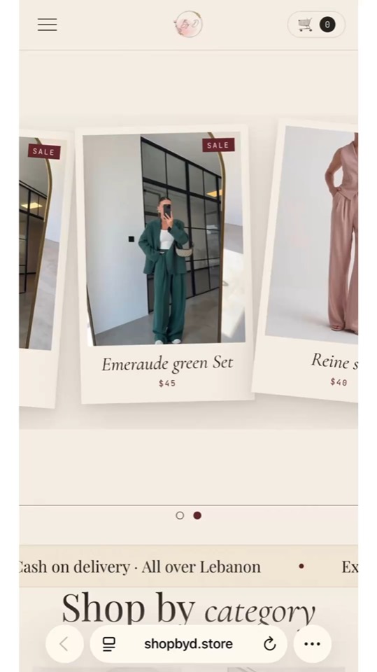 the BY D storefront, shown on a phone